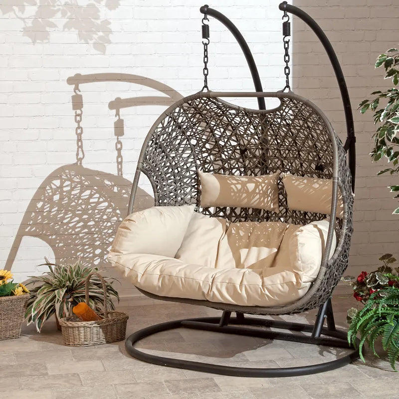 Brown all-weather rattan egg hanging basket swing chair with cushion and stand
