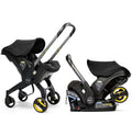 Nitro black DOONA infant car seat stroller travel system with LATCH base