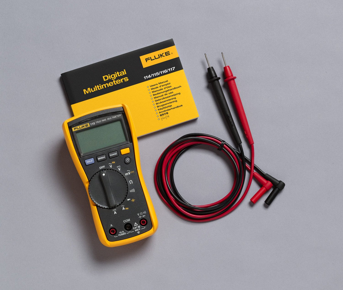 Fluke 115 True-RMS Digital Multimeter – AC/DC to 600V, 10A Current, Resistance & Capacitance, with Holster & Leads