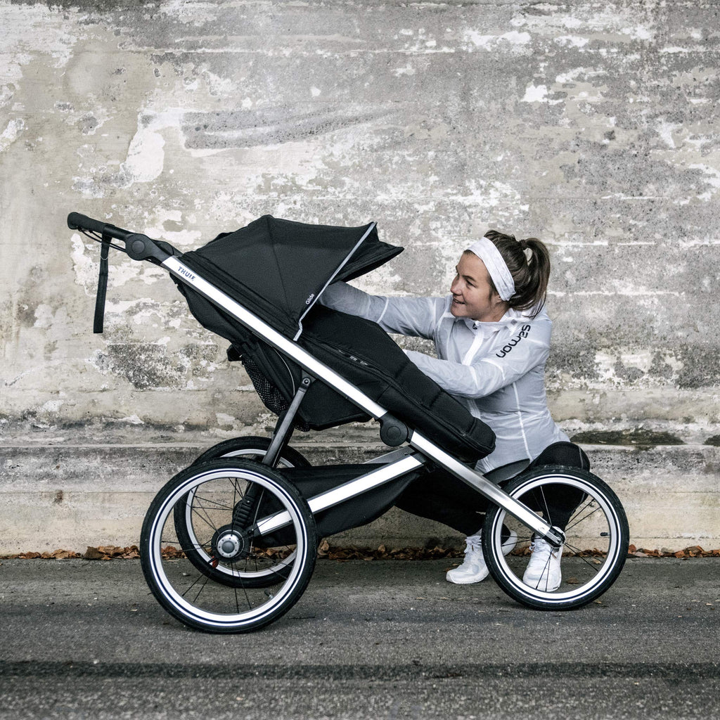 Thule Glide Performance Jogging Stroller – Fixed 16" Front Wheel, Hand Brake, Compact Fold (Black/Blue)